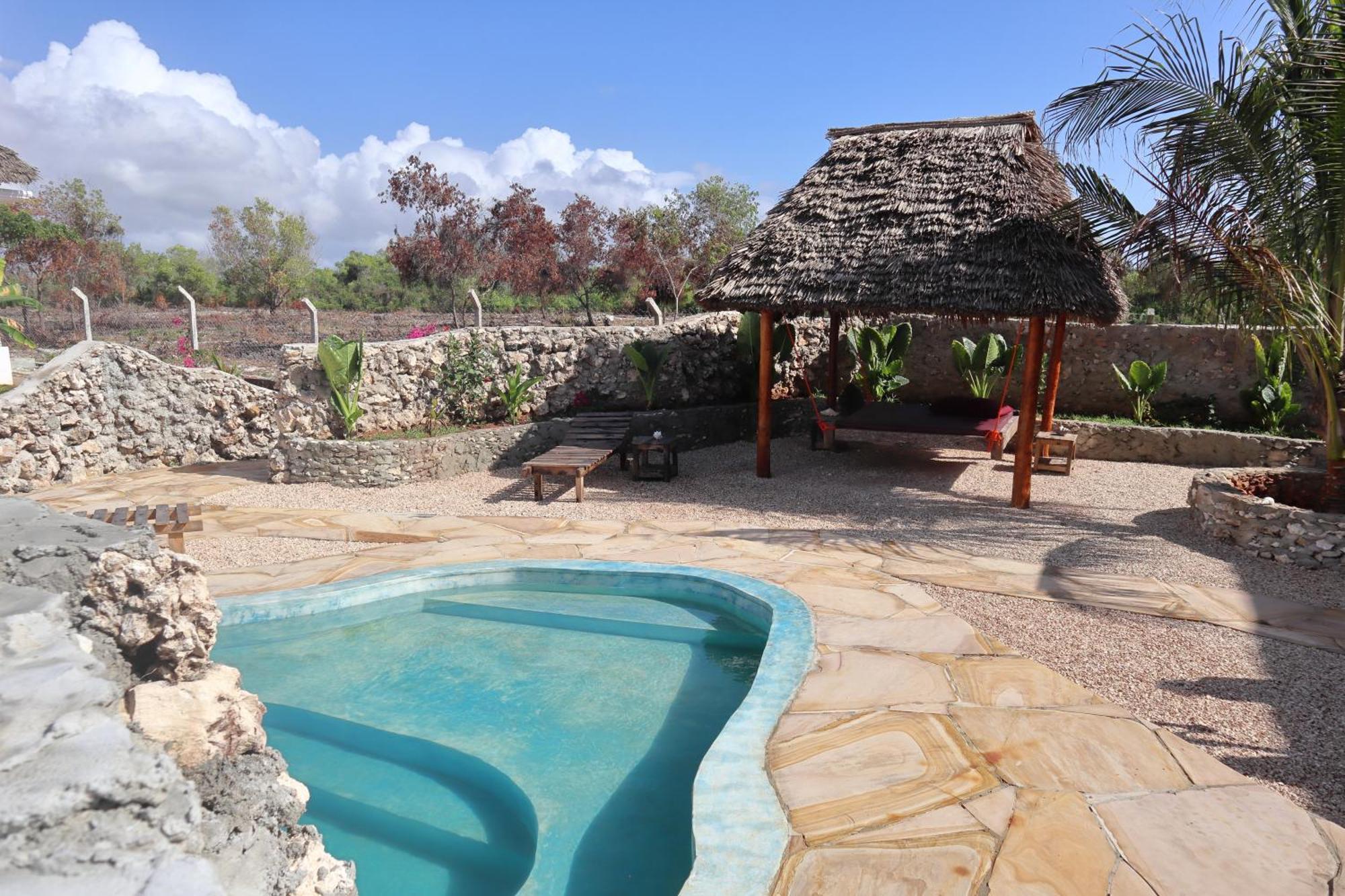 Holiday Time Bungalows Zanzibar มาเทมวu ภายนอก รูปภาพ